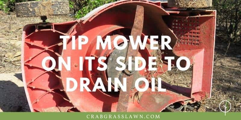 Tip Mower on its side to drain oil